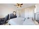Well-lit bedroom with neutral walls, a dark desk, and a ceiling fan at 371 Luray Way, Rock Hill, SC 29730