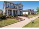 Charming two-story home featuring a welcoming front porch and a well-manicured landscaped yard in a nice neighborhood at 371 Luray Way, Rock Hill, SC 29730