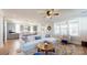Bright living room showcasing a plush rug, comfortable seating, and an open layout with kitchen views at 371 Luray Way, Rock Hill, SC 29730