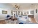 Open-concept living space with seamless flow to the kitchen and a staircase leading to upper level at 371 Luray Way, Rock Hill, SC 29730