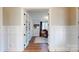 View of the home office featuring wood floors, a rug, and a dark curtain near the window at 371 Luray Way, Rock Hill, SC 29730