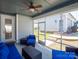 Cozy screened-in patio with comfortable seating, offering a relaxing outdoor space with views of the backyard at 371 Luray Way, Rock Hill, SC 29730