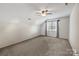 Cozy attic bedroom with carpeted floors, a window, and sloped ceilings, offering a private retreat at 374 Queens Sw Dr, Concord, NC 28025