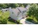 Charming two-story home with attached garage, landscaped yard, and inviting front entrance at 374 Queens Sw Dr, Concord, NC 28025