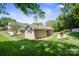 Outbuilding in a shady backyard. Perfect for hobbies and storage at 374 Queens Sw Dr, Concord, NC 28025
