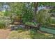 Landscaped garden area with a potting table and raised beds ready for planting and enjoying at 385 Gum Branch Rd, Charlotte, NC 28214