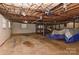 Spacious unfinished basement area with concrete floor and visible utilities at 385 Gum Branch Rd, Charlotte, NC 28214