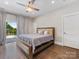 Bedroom with hardwood floors and balcony access at 4315 Hartis Grove Church Rd, Indian Trail, NC 28079