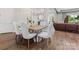 The dining area features stylish chairs and hardwood flooring, with a view of the kitchen at 4315 Hartis Grove Church Rd, Indian Trail, NC 28079