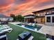 Beautiful backyard featuring a swimming pool, patio, outdoor seating, and lush landscaping, perfect for outdoor living at 4315 Hartis Grove Church Rd, Indian Trail, NC 28079