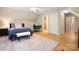 Bedroom featuring a comfortable bed, workspace, and natural light at 4570 Chanel Ct, Concord, NC 28025