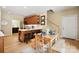Kitchen with a breakfast bar, white countertops, stainless steel appliances and an adjoining dining area at 4570 Chanel Ct, Concord, NC 28025