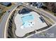 Aerial view of the neighborhood pool area with lap lanes, shade pavilion, and parking at 5063 Gribble Ln, Lancaster, SC 29720