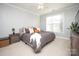 Serene primary bedroom with neutral tones, a ceiling fan, and plush carpeting at 5063 Gribble Ln, Lancaster, SC 29720