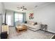 Bright living room with natural light, hardwood floors, and access to the outdoors at 5063 Gribble Ln, Lancaster, SC 29720