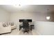 Office space with a desk, multiple monitors, a gaming chair, and two armchairs at 5063 Gribble Ln, Lancaster, SC 29720