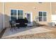 Outdoor patio area with a grill covered and seating for outdoor entertaining at 5063 Gribble Ln, Lancaster, SC 29720