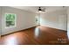 Bedroom with hardwood floors, ceiling fan, windows for natural light, and a closet at 5075 Meanna Dr, Clover, SC 29710
