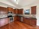 Modern kitchen with stainless steel appliances and dark countertops at 5075 Meanna Dr, Clover, SC 29710