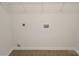 A laundry room with tile flooring, a wire shelf and hook-ups for a washer and dryer at 5075 Meanna Dr, Clover, SC 29710