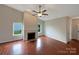Bright living room featuring fireplace and hardwood floors at 5075 Meanna Dr, Clover, SC 29710