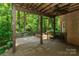 Relax on this spacious back deck with ceiling fan and lights overlooking the fenced backyard at 5321 Kathryn Blair Ln, Charlotte, NC 28226