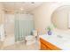 Bright bathroom with a shower/tub combo, vanity and decorative mirror at 5321 Kathryn Blair Ln, Charlotte, NC 28226