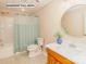 Full bathroom featuring a vanity with a round mirror and a tub with shower at 5321 Kathryn Blair Ln, Charlotte, NC 28226