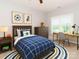A bedroom with a soccer theme and a desk for studying at 5321 Kathryn Blair Ln, Charlotte, NC 28226