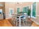 Cozy dining room with a chandelier, table for six, and natural lighting at 5321 Kathryn Blair Ln, Charlotte, NC 28226