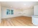 Spacious flex space with hardwood floors and a large window providing lots of natural light at 5321 Kathryn Blair Ln, Charlotte, NC 28226