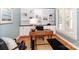 Comfortable home office with custom built-ins, hardwood floors, and natural light at 5321 Kathryn Blair Ln, Charlotte, NC 28226