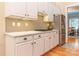 Well-equipped kitchen featuring white cabinets, stainless steel appliances, and sleek countertops for a modern look at 5321 Kathryn Blair Ln, Charlotte, NC 28226