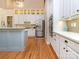 Well-equipped kitchen with modern appliances, updated cabinets, and hardwood floors at 5321 Kathryn Blair Ln, Charlotte, NC 28226