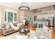 Spacious living room with hardwood floors and plenty of natural light at 5321 Kathryn Blair Ln, Charlotte, NC 28226