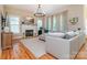 Comfortable living room with a fireplace, large sectional, and hardwood floors at 5321 Kathryn Blair Ln, Charlotte, NC 28226
