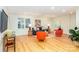 Cozy living room featuring wood floors, comfortable seating, and bright, colorful decor at 5321 Kathryn Blair Ln, Charlotte, NC 28226