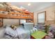 Bedroom featuring a wooden bunk bed, storage containers and a window at 565 Shore Acres Rd, Salisbury, NC 28146
