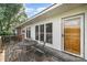 Outdoor deck featuring chairs and a table, perfect for relaxation and entertaining at 565 Shore Acres Rd, Salisbury, NC 28146