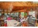 Spacious living room features hardwood floors, tongue and groove ceiling and lots of natural light at 565 Shore Acres Rd, Salisbury, NC 28146