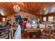 Spacious living room with hardwood floors, tongue and groove ceiling and lots of natural light at 565 Shore Acres Rd, Salisbury, NC 28146