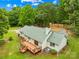 Enjoy this well-maintained home with a spacious wooden deck overlooking a lush backyard and tree coverage at 5903 Wm Griffin Rd, Monroe, NC 28112