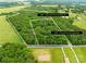 Aerial view of the property highlighting acreage, surrounding landscape, and potential building sites at 5903 Wm Griffin Rd, Monroe, NC 28112