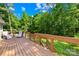 Inviting back deck overlooking a lush, green yard, providing a peaceful retreat with comfortable lounge chairs at 5903 Wm Griffin Rd, Monroe, NC 28112