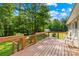 Spacious wooden deck with seating, perfect for outdoor entertaining and enjoying the tranquil backyard at 5903 Wm Griffin Rd, Monroe, NC 28112