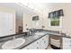 Bright bathroom with double sinks, a large mirror, and plenty of counter space at 5903 Wm Griffin Rd, Monroe, NC 28112