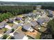 Aerial view of a neighborhood with homes, yards, and streets at 6719 Jerimoth Dr, Charlotte, NC 28215
