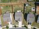 Aerial view of a neighborhood with fenced yards and landscaping at 6719 Jerimoth Dr, Charlotte, NC 28215
