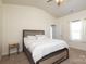 Comfortable bedroom featuring neutral colors, ceiling fan, and ample natural light at 6719 Jerimoth Dr, Charlotte, NC 28215