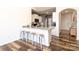 Bright kitchen featuring a breakfast bar with seating, granite countertops, and modern appliances at 6719 Jerimoth Dr, Charlotte, NC 28215